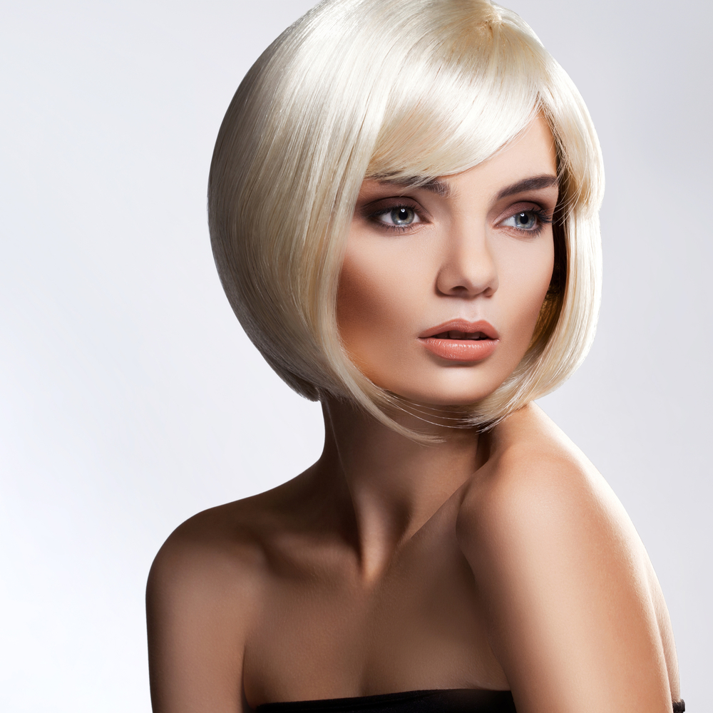 Blonde Hair. Portrait of beautiful blonde with with Short Hair. High quality image.