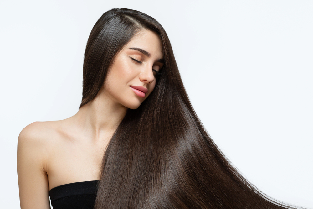 Long smooth shiny hair showing results of repair moisture and smoothing treatments