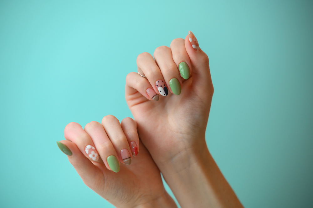 Colorful 2026 nail art with green, pink, floral and detailed designs
